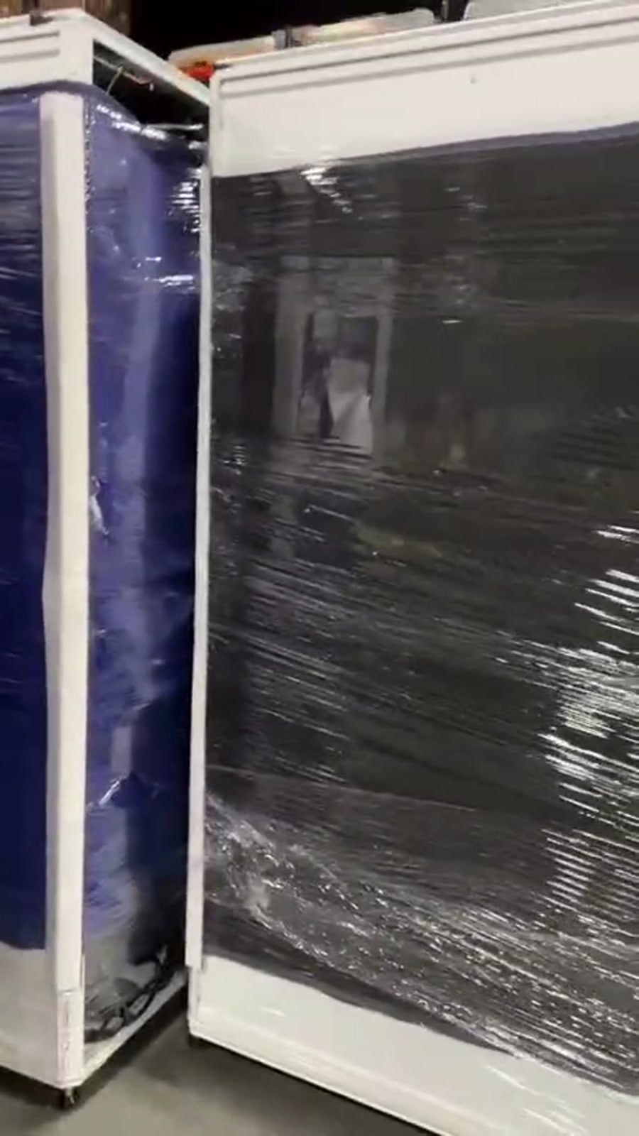 Wrapped cabinet front and neighboring rack from the supplied hardware video